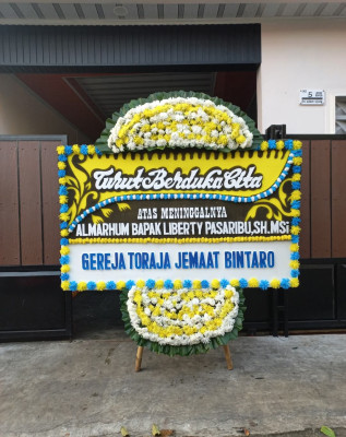 Papan Bunga Duka di Waihaong